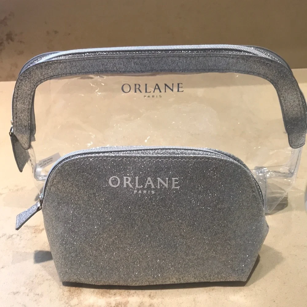 NWOT Orlane Paris cosmetic bags in sparkly silver
